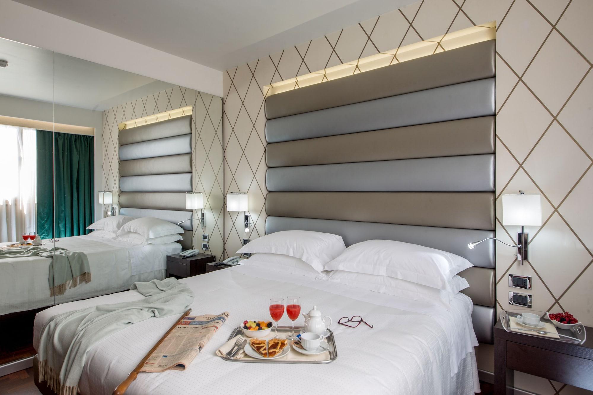 Enea Hotel Помеция Екстериор снимка