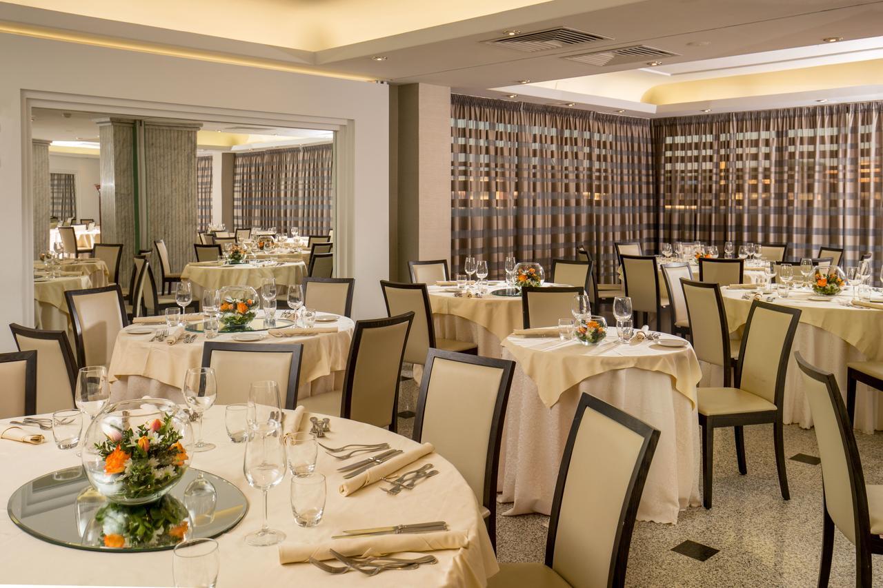 Enea Hotel Помеция Екстериор снимка