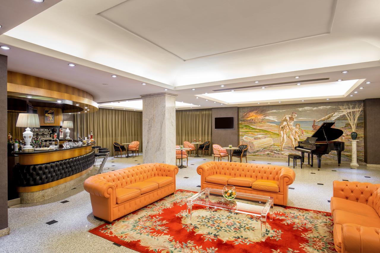 Enea Hotel Помеция Екстериор снимка
