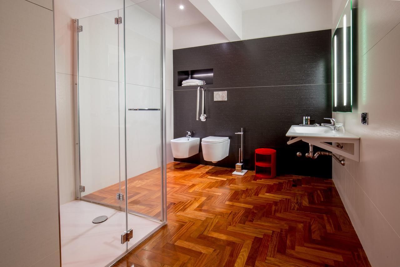 Enea Hotel Помеция Екстериор снимка